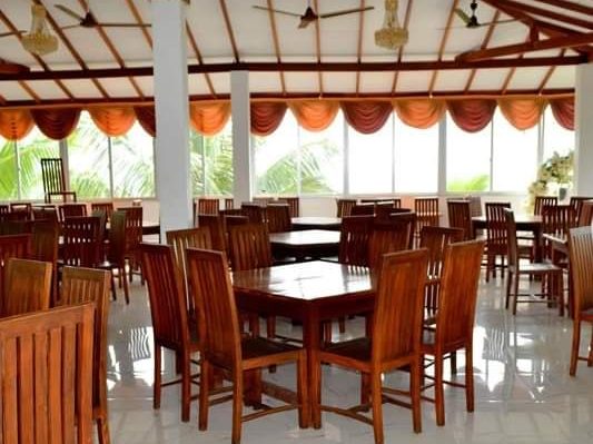 Open-air restaurant laid out for a group