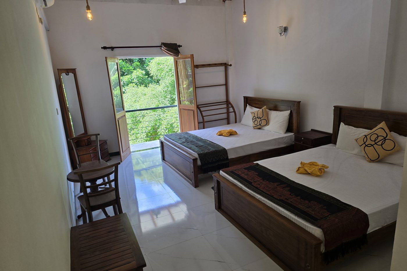 Renovated twin room with a garden window